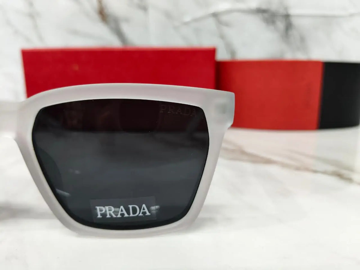 PRADA 0626 TRANSPARENT GREY METAL LOGO